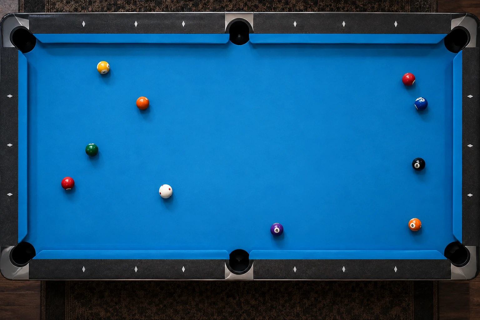 Generic six-pocket table with one solid white cue ball and resting colored balls, without a cue stick, curved route arrows or target overlays