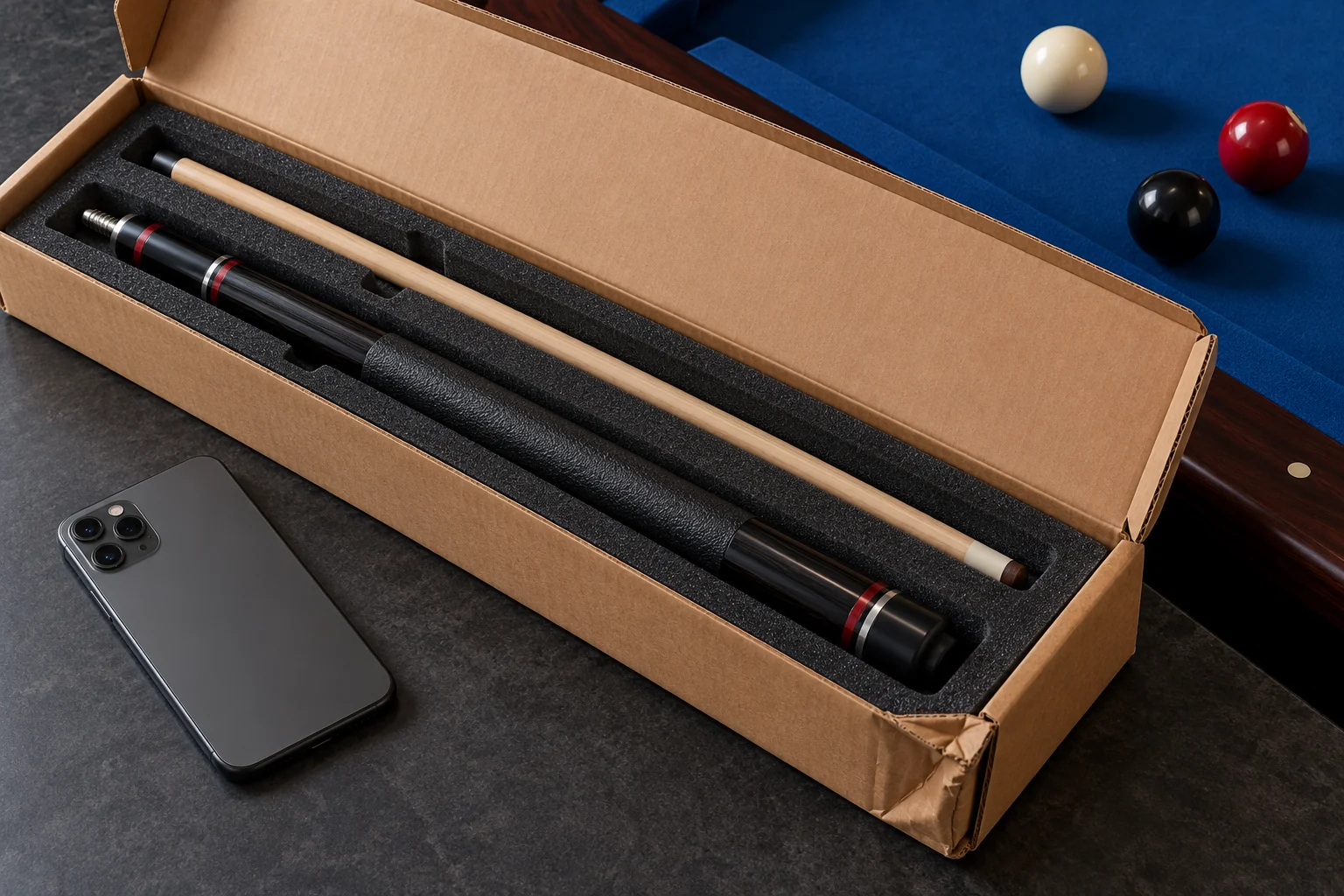 Illustration of an open padded cue carton with a dented corner and a smartphone beside the separate cue pieces