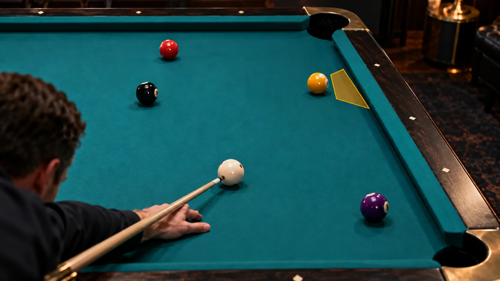Editorial pool scene with a narrow gold short-side finish area beside an object ball and rail, with no predicted trajectory