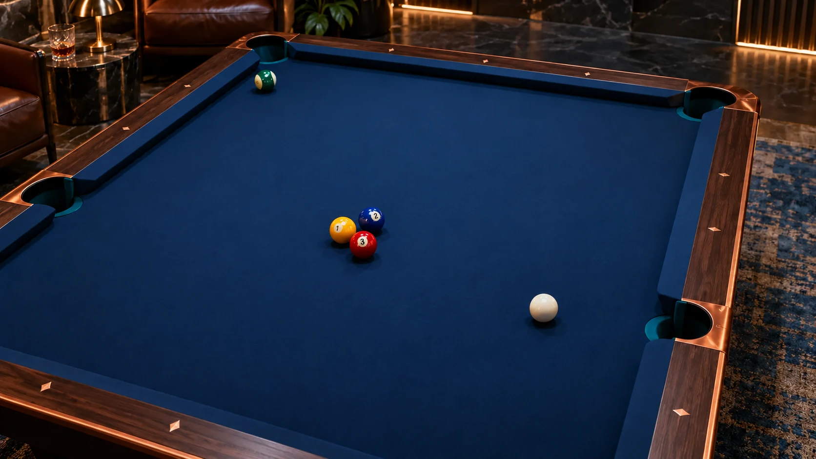 Original still of three loosely grouped object balls, a separate cue ball and an insurance ball on blue pool cloth