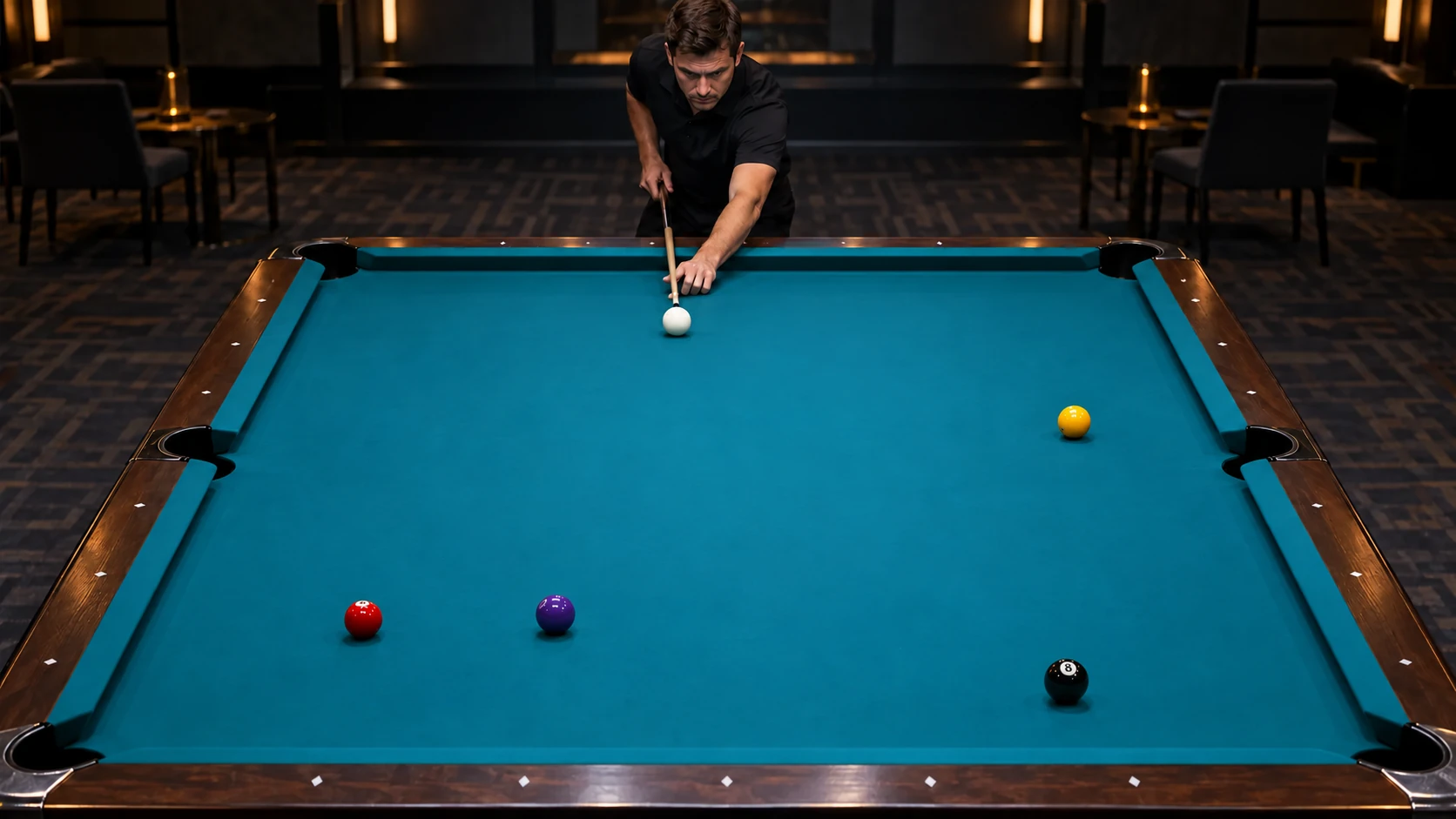 Pool player assessing a quiet table with stationary balls and no trajectory overlays